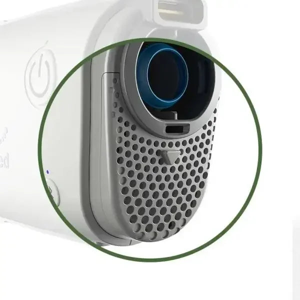 Close-up of a CPAP machine air filter and vent, medical sleep apnea device component