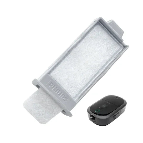 CPAP machine filter and black travel-sized CPAP device for sleep apnea