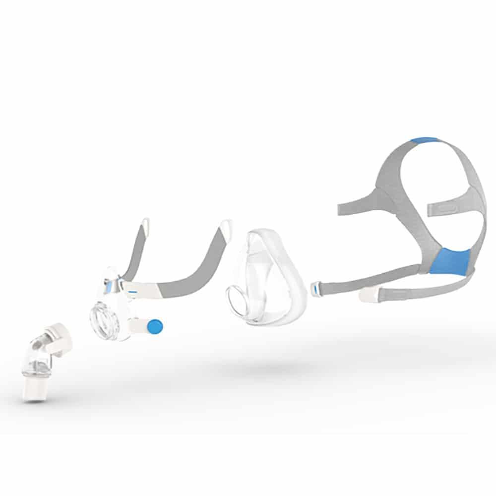 Exploded view of a CPAP mask with straps, cushion, and connectors for sleep apnea therapy.