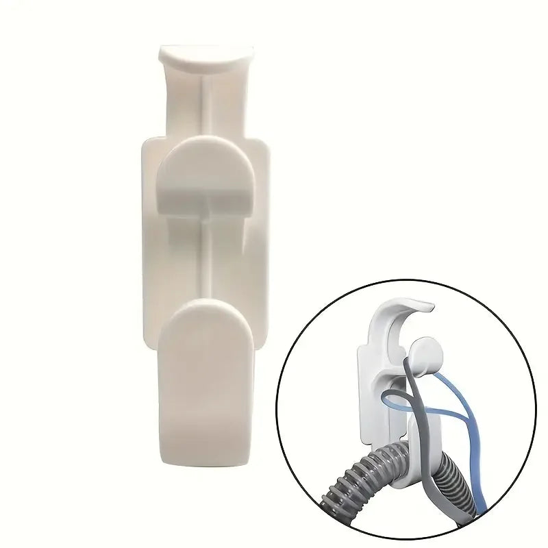 White CPAP hose and mask hanger wall mount for CPAP accessories organization