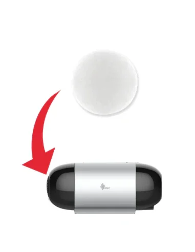 CPAP filter replacement with red arrow pointing to a compact CPAP machine