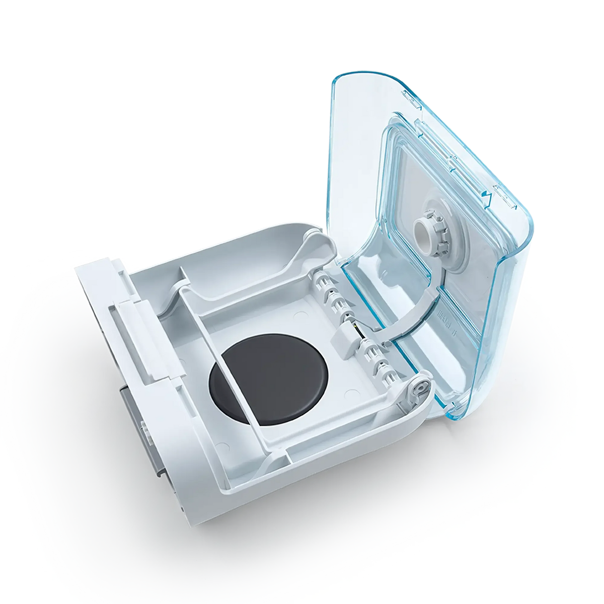 Open CPAP humidifier water chamber with a clear lid and white base
