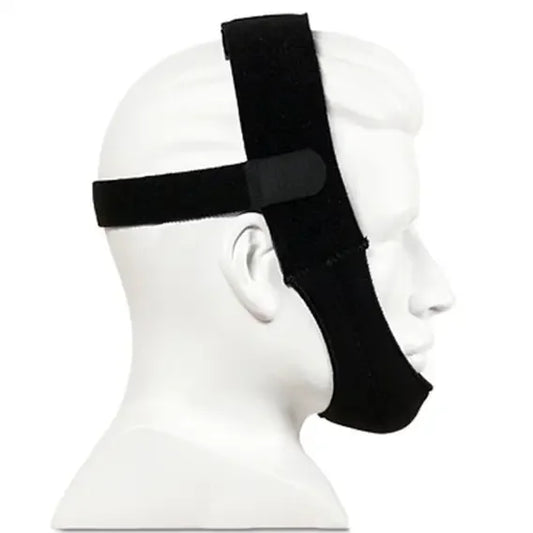 Black adjustable CPAP chin strap on mannequin head for sleep apnea support