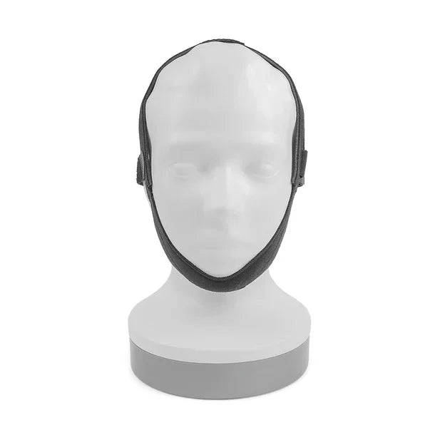 CPAP chin strap on mannequin, sleep apnea anti-snoring headgear accessory