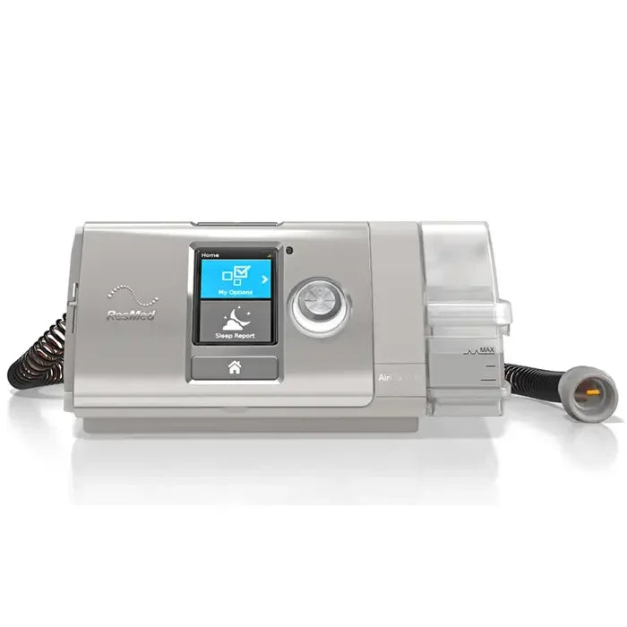 Automatic CPAP machine with touchscreen and attached humidifier on white background