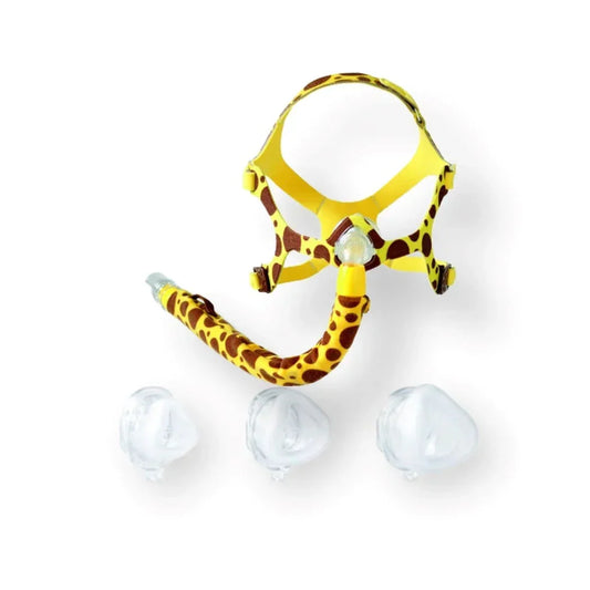 Pediatric CPAP nasal mask with giraffe print, hose cover, and three silicone cushions.