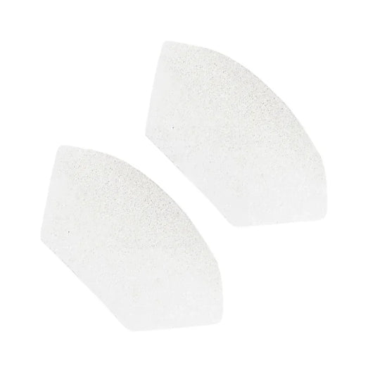 Pair of white foam CPAP machine filters on a white background