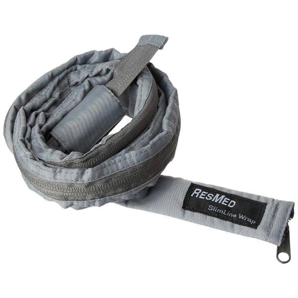 Rolled grey CPAP hose wrap with visible ResMed SlimLine label, sleeping accessory.