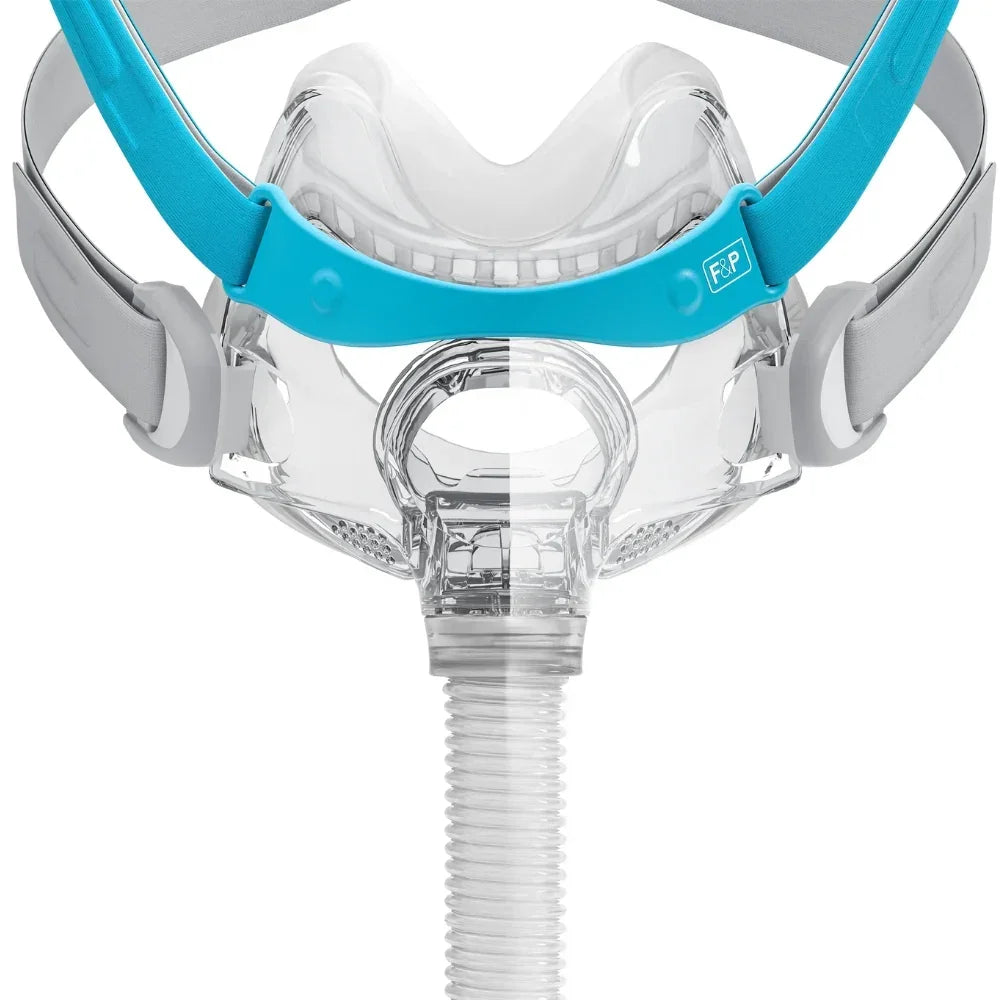 CPAP mask with blue headgear on a white background