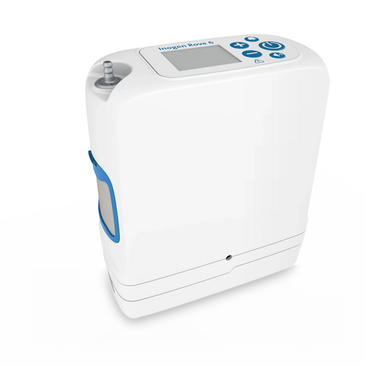 A white and blue medical oxygen concentrator, identified as the Ingen Breeze 6, shown on a white background with a gray floor reflection.