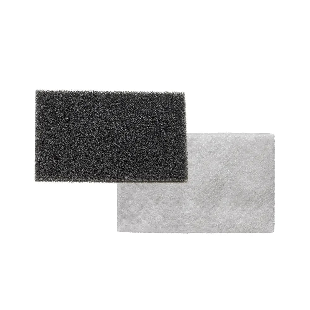 Black and white CPAP machine filter pads on white background for sleep apnea supplies