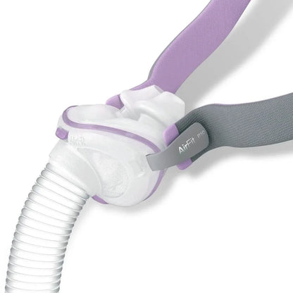 AirFit P10 nasal CPAP mask with gray and lavender headgear for sleep apnea therapy