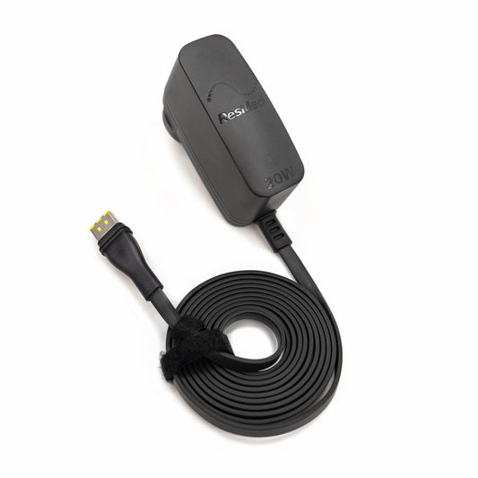 ResMed AirMini 20W AC power adapter and charging cable designed for the AirMini travel CPAP machine.