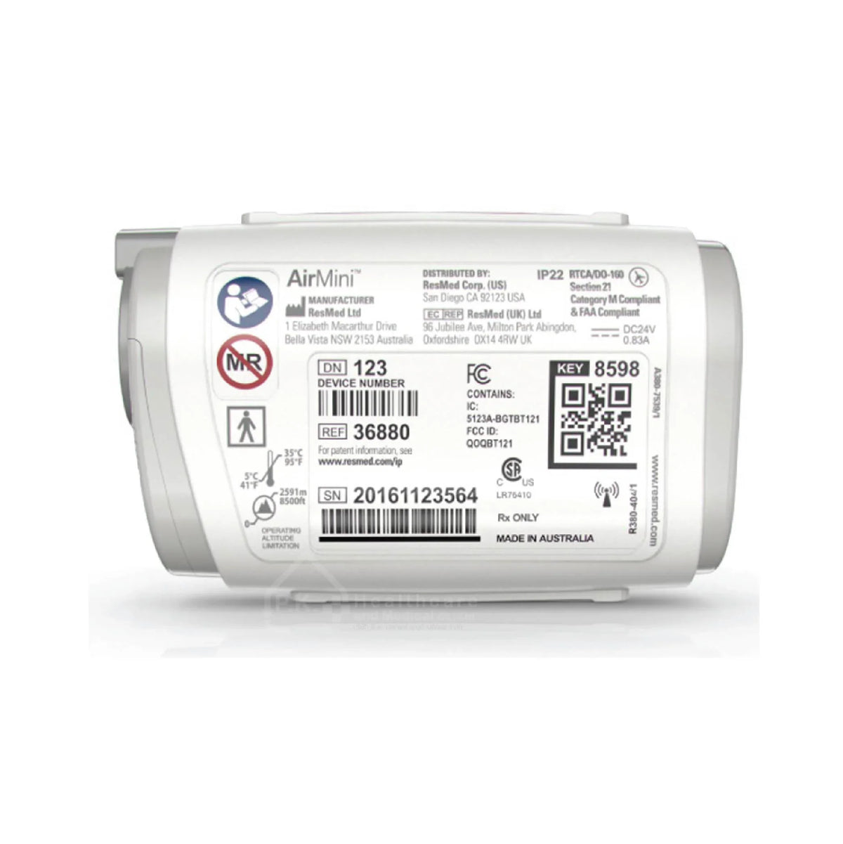 The back of a travel cpap machine, showing various regulatory labels, barcodes, QR codes, and the AirMini brand logo on a white background.