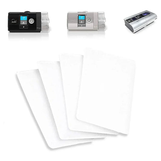 CPAP machine filters with CPAP devices for sleep apnea therapy shown on white background.
