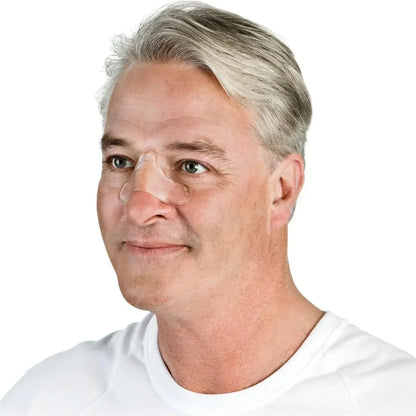 Image of Man With ResMed Gecko Nasal Pad On