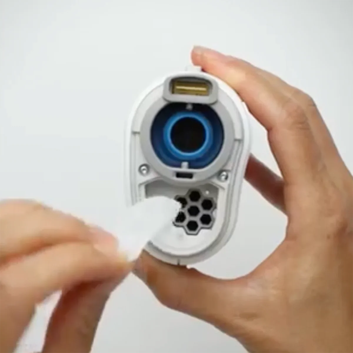 A close-up of a the Airmini device with the Filter