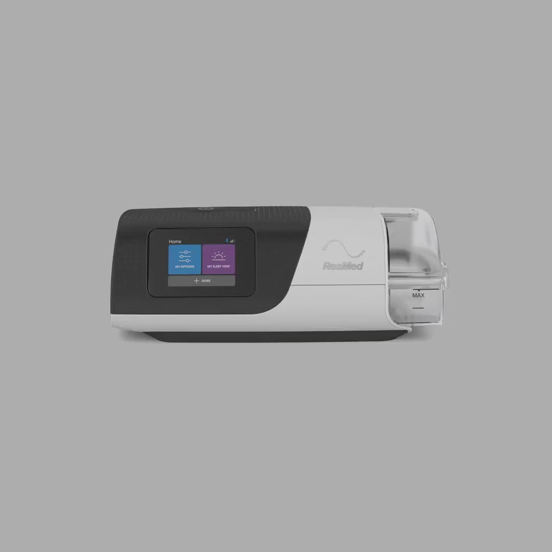 Video showing the ResMed AirSense 11 AutoSet CPAP machine from multiple angles with integrated humidifier and touchscreen display.